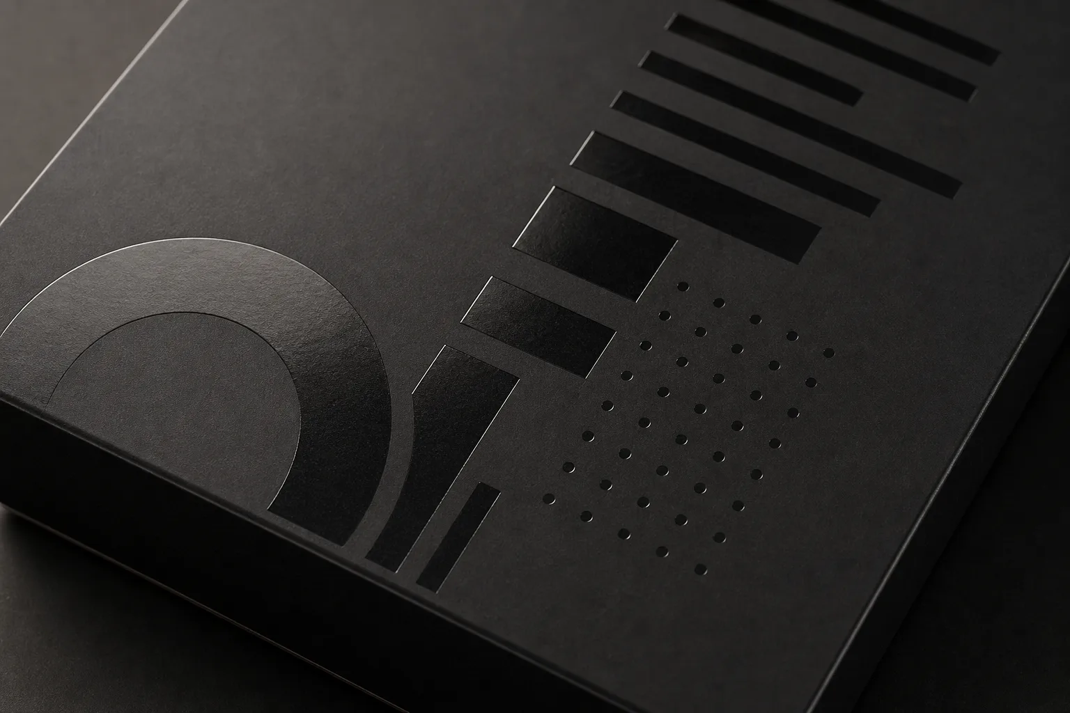 Glossy spot UV pattern on matte black packaging