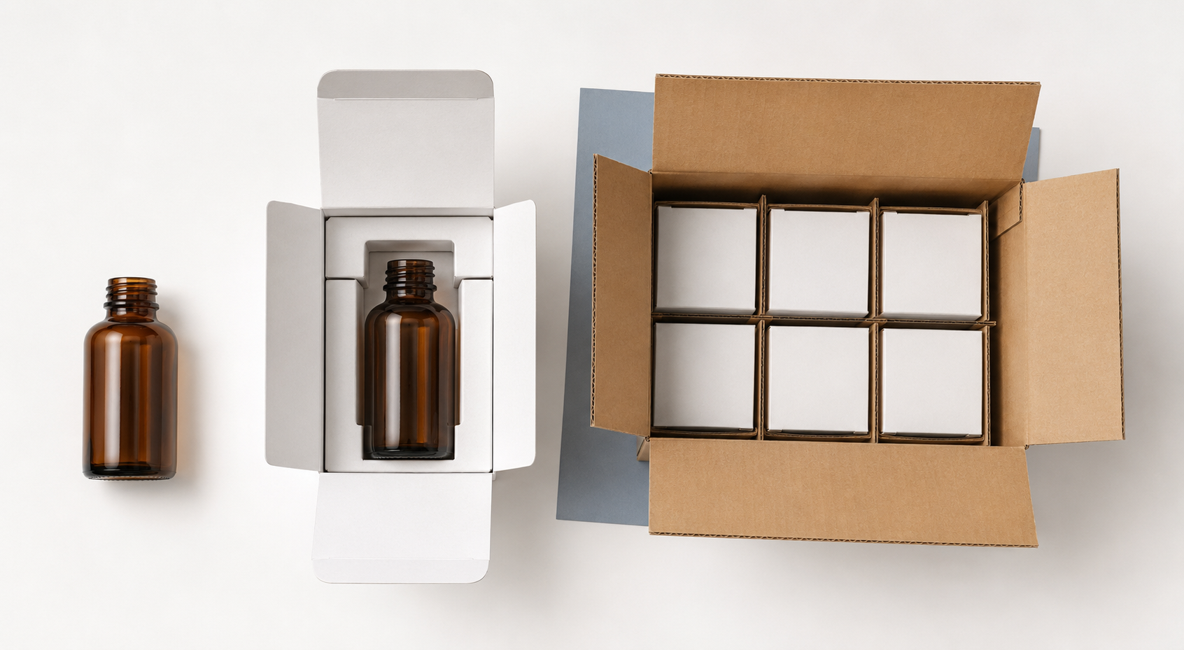 Amber bottle, paperboard insert inside an open unit carton, and corrugated distribution case holding several cartons as separate package layers